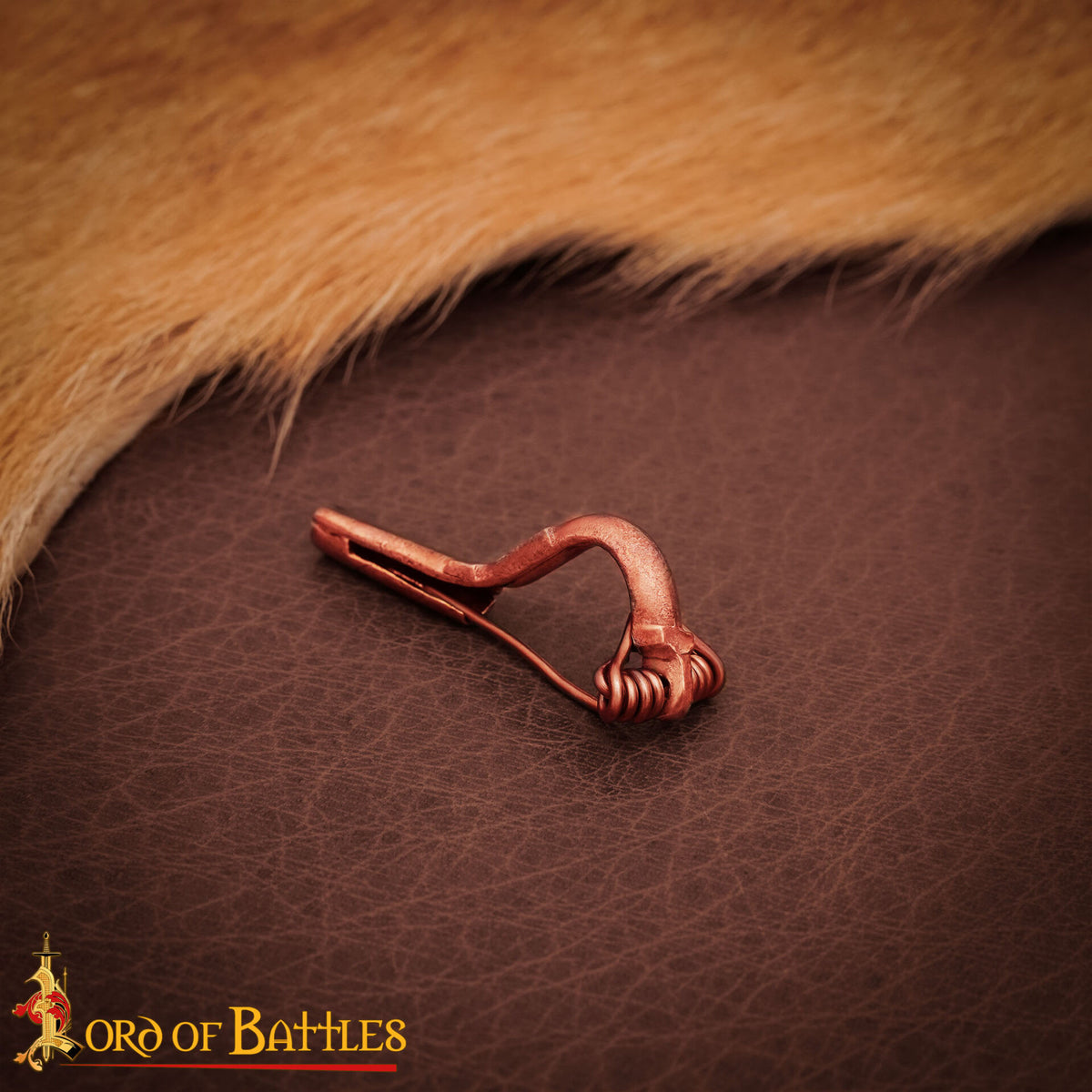 Broche rodilla romana tardoimperial bronce fundido