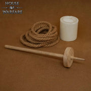 Husillo medieval en madera para hilado a mano