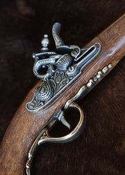 Pistola francesa de chispa latonada, siglo XVIII