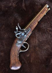 Pistola francesa de chispa latonada, siglo XVIII